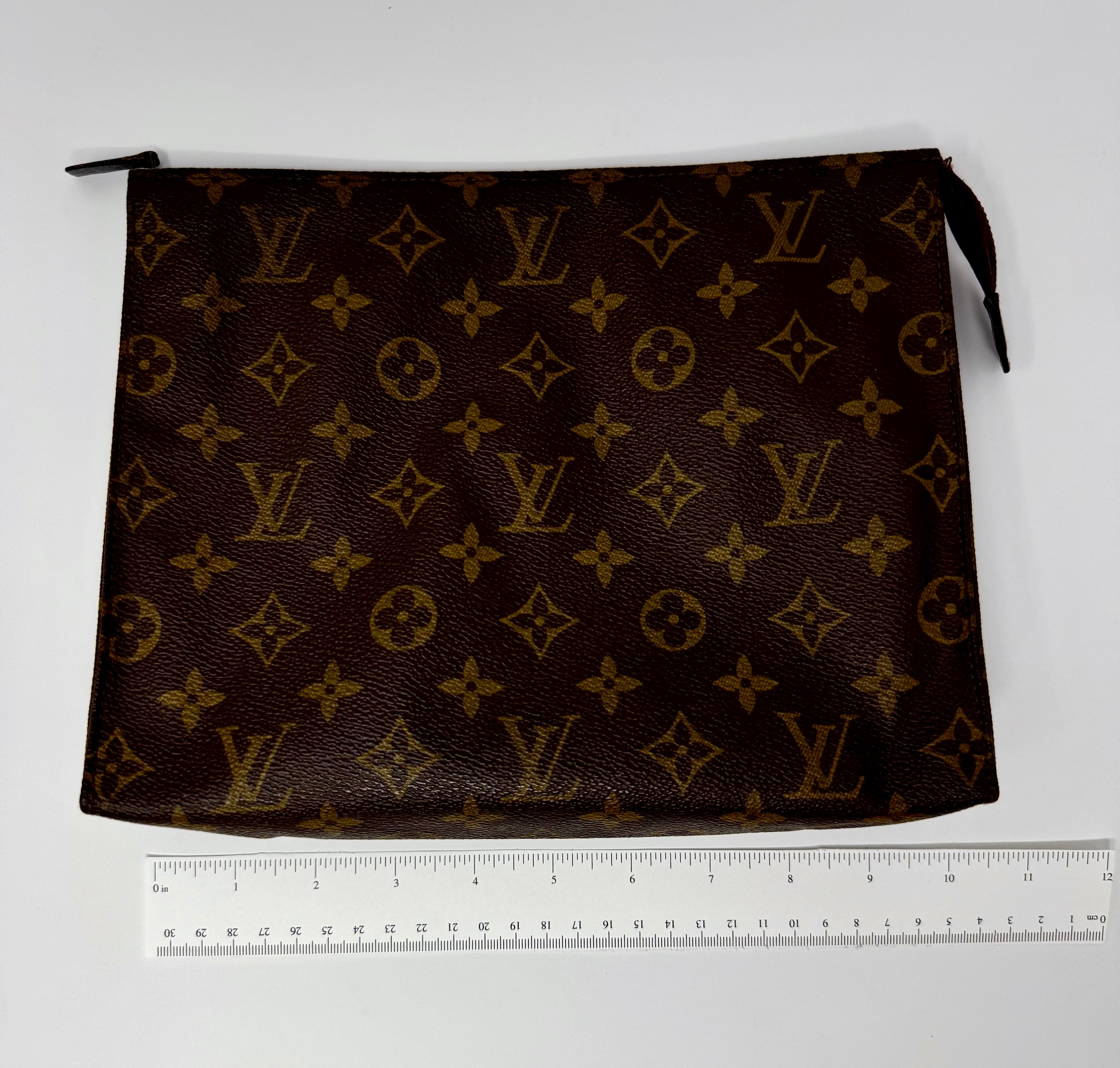 Vintage Louis Vuitton Monogram Toiletry Pouch Clutch – 833 (March 1983)