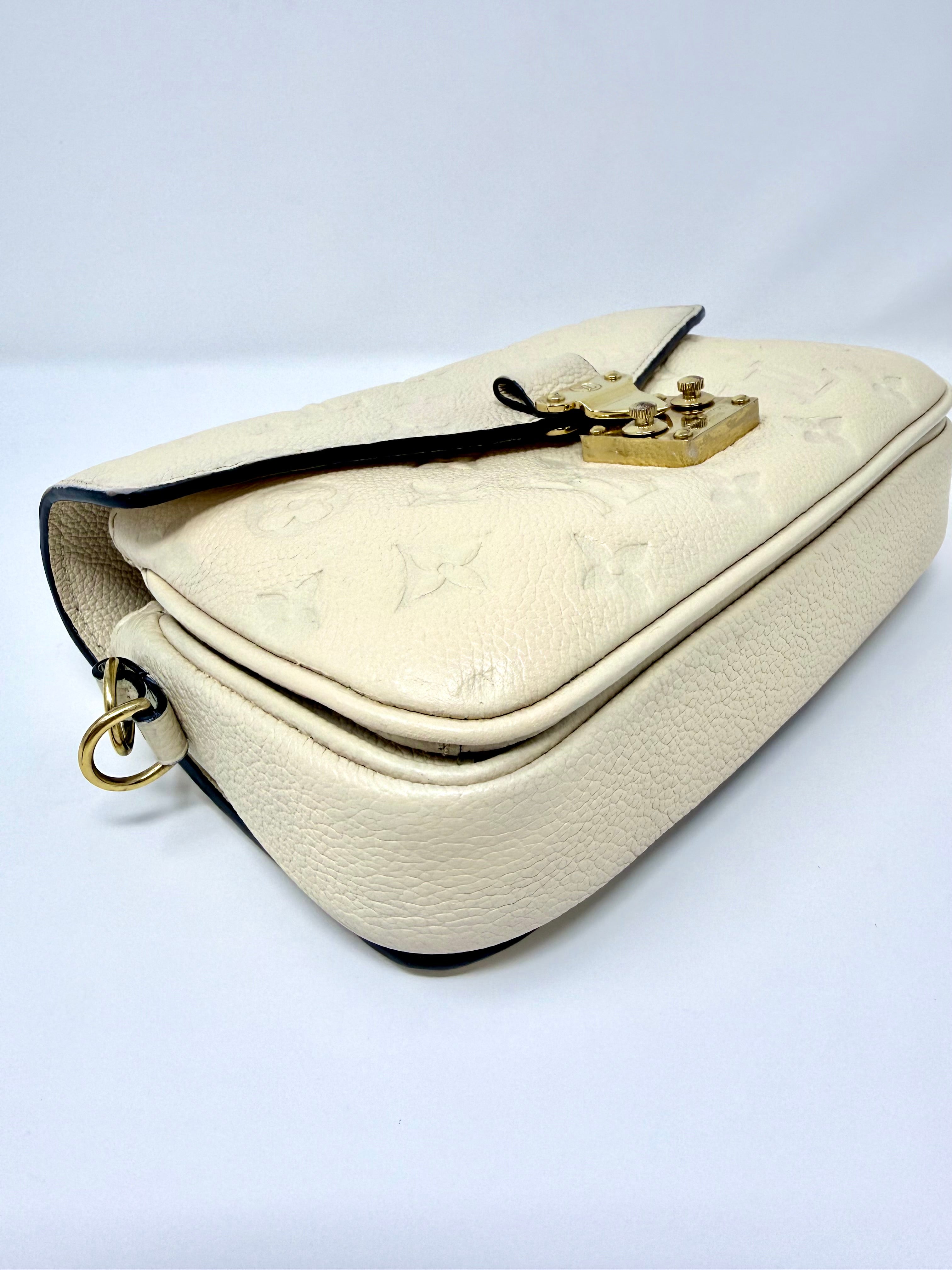 Louis Vuitton East West Pochette Métis – Monogram Empreinte Leather (Creme Beige) with Gold Hardware