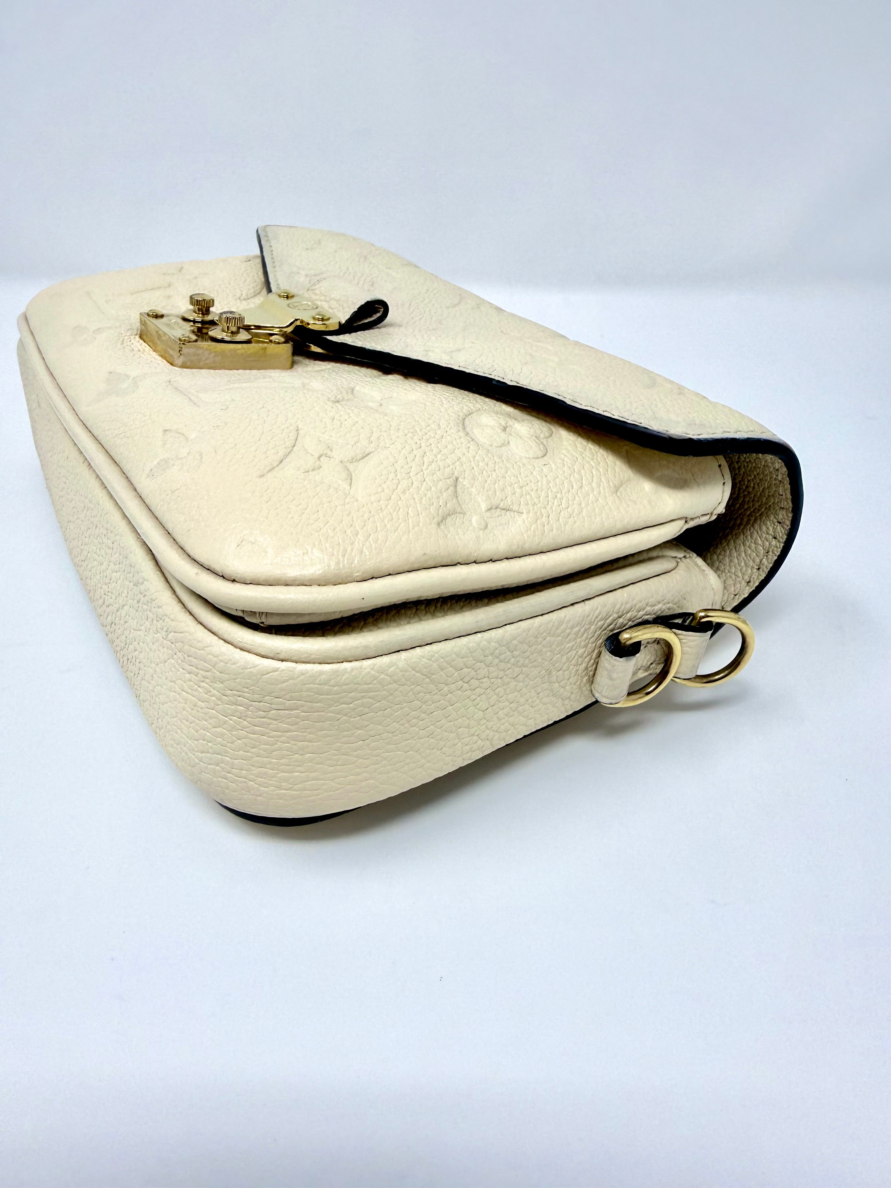 Louis Vuitton East West Pochette Métis – Monogram Empreinte Leather (Creme Beige) with Gold Hardware