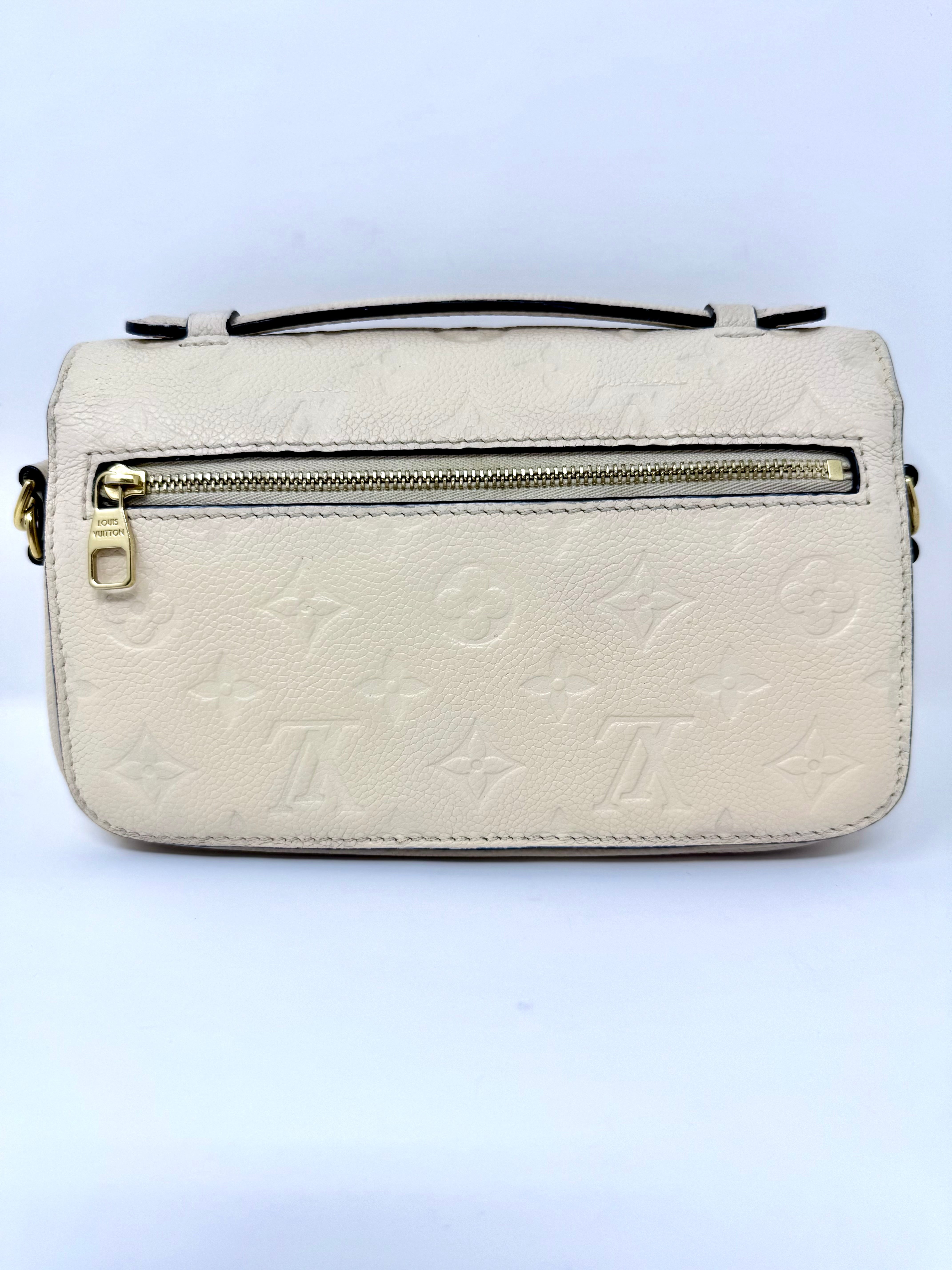 Louis Vuitton East West Pochette Métis – Monogram Empreinte Leather (Creme Beige) with Gold Hardware