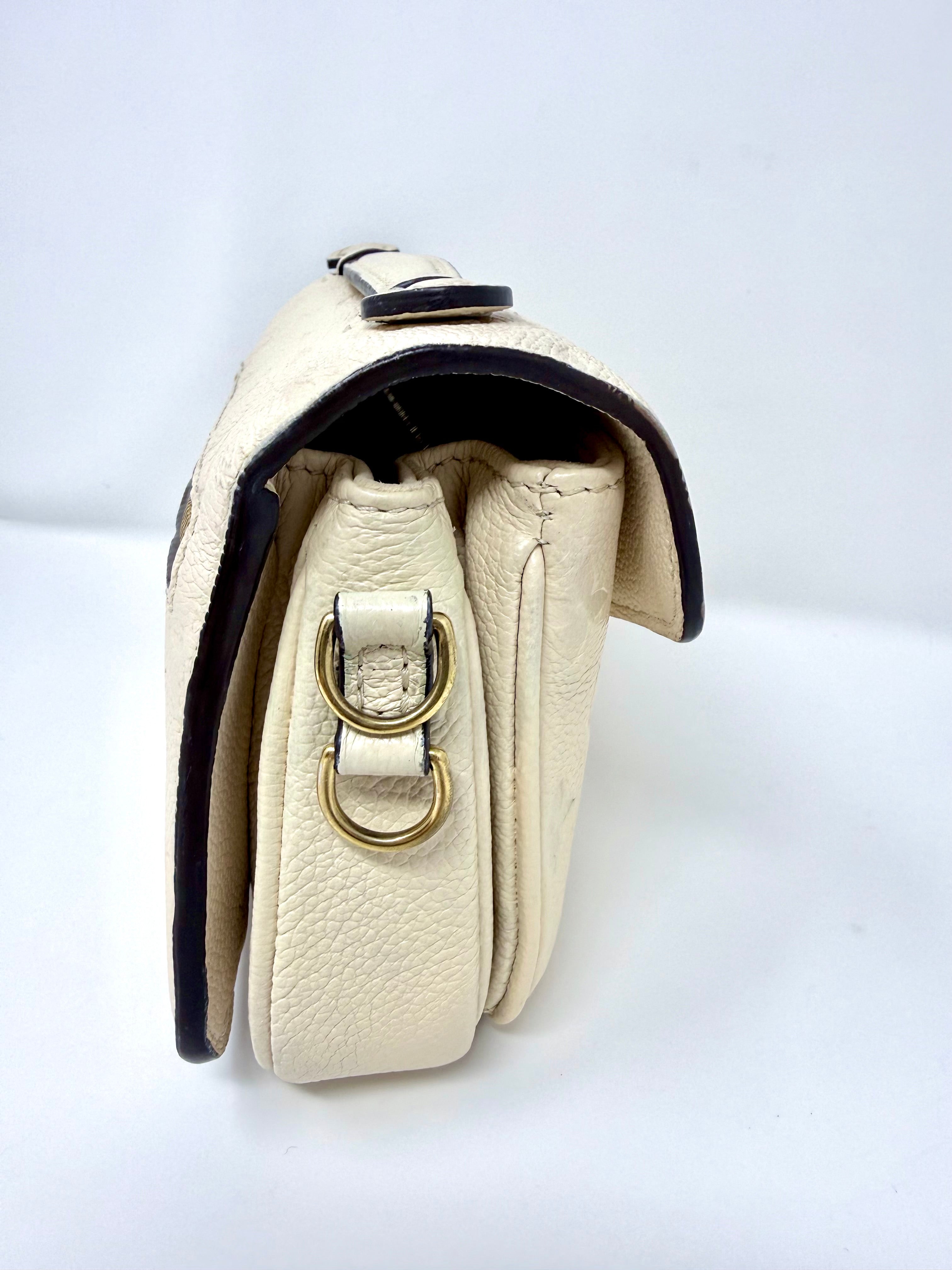 Louis Vuitton East West Pochette Métis – Monogram Empreinte Leather (Creme Beige) with Gold Hardware