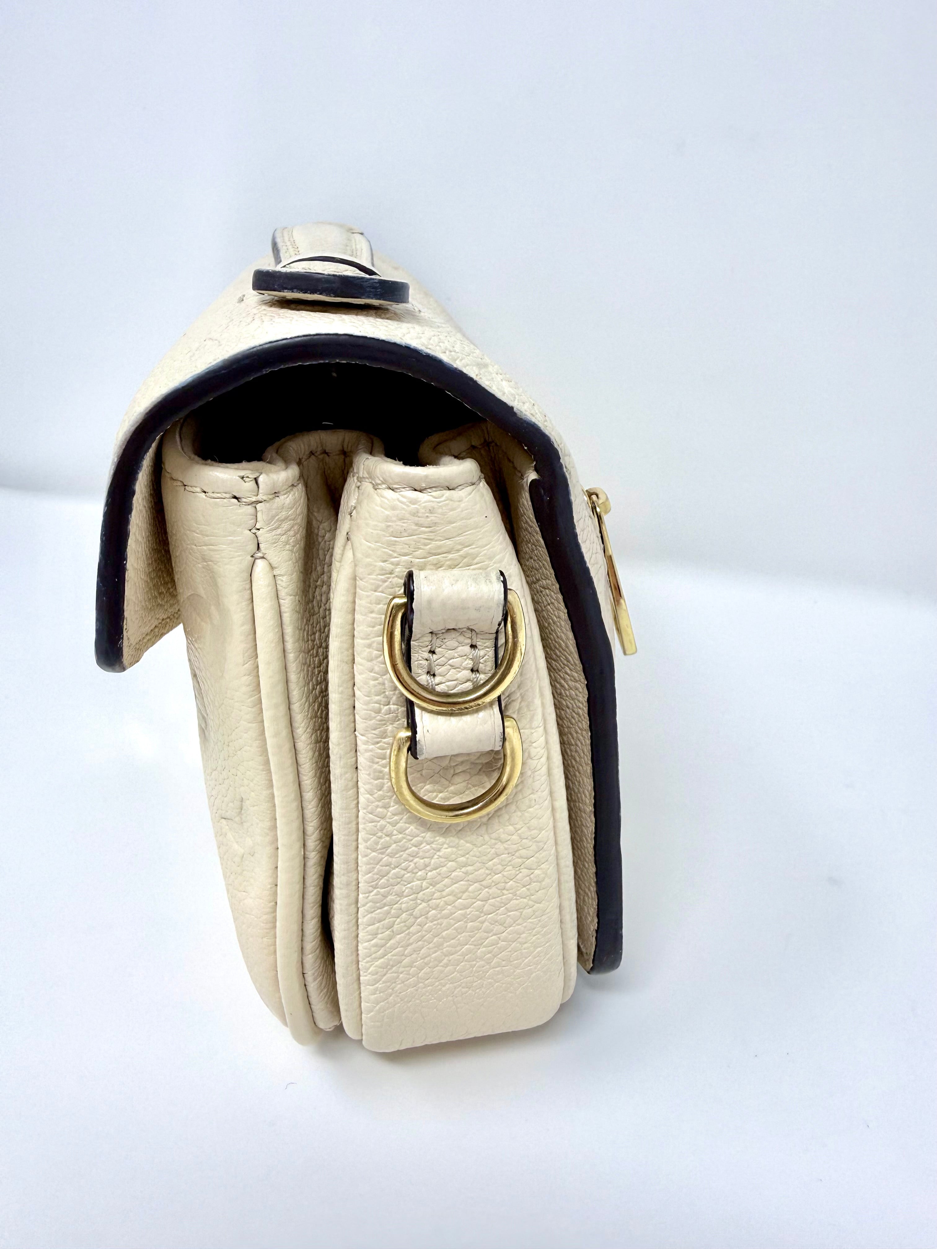 Louis Vuitton East West Pochette Métis – Monogram Empreinte Leather (Creme Beige) with Gold Hardware
