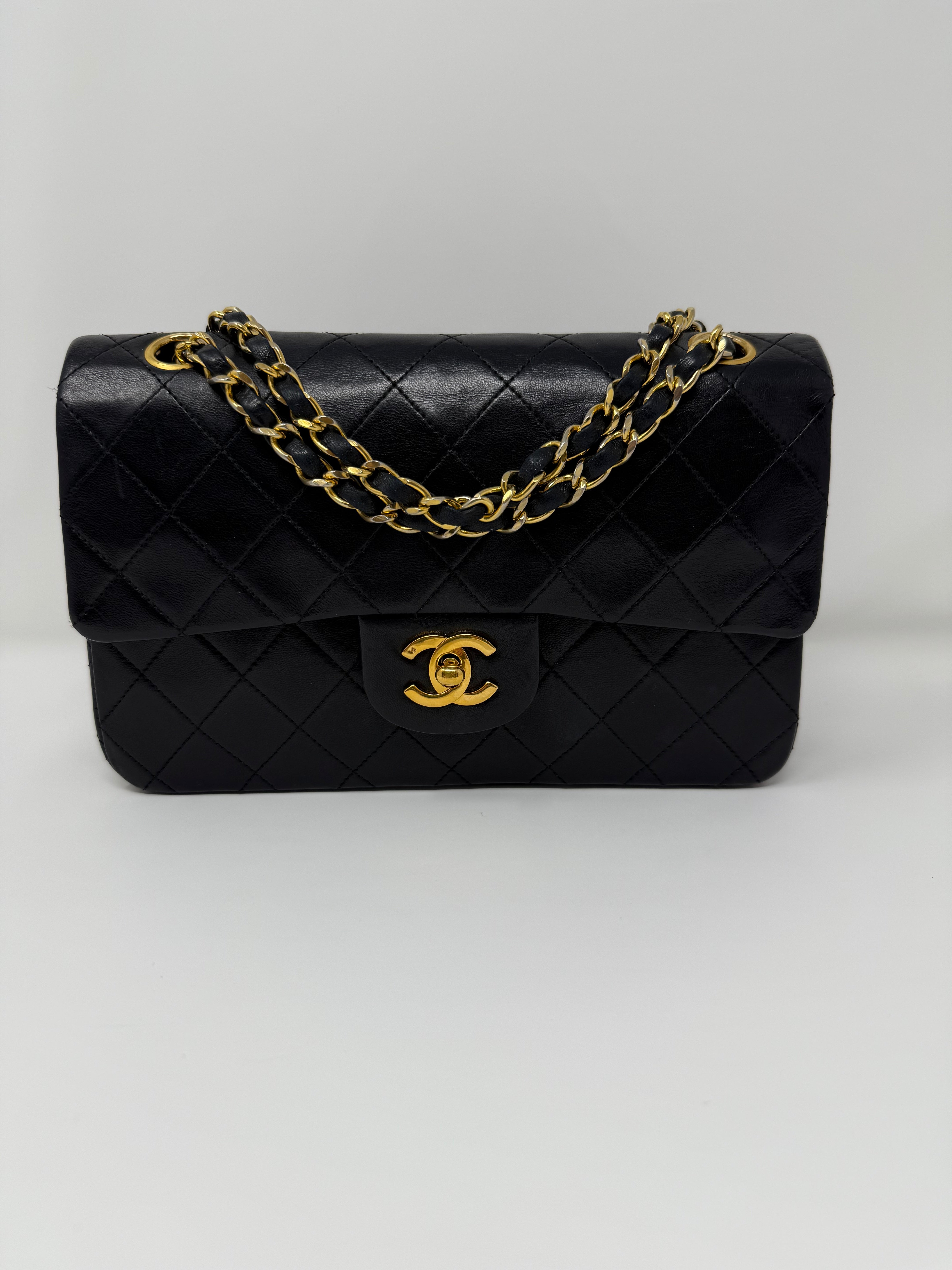 Vintage Chanel Small Classic Double Flap Bag– Black Lambskin with 24K Gold HW